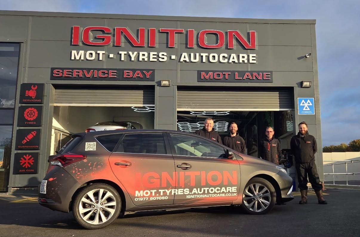 Ignition Autocare team with branded vehicle outside the Castleford garage